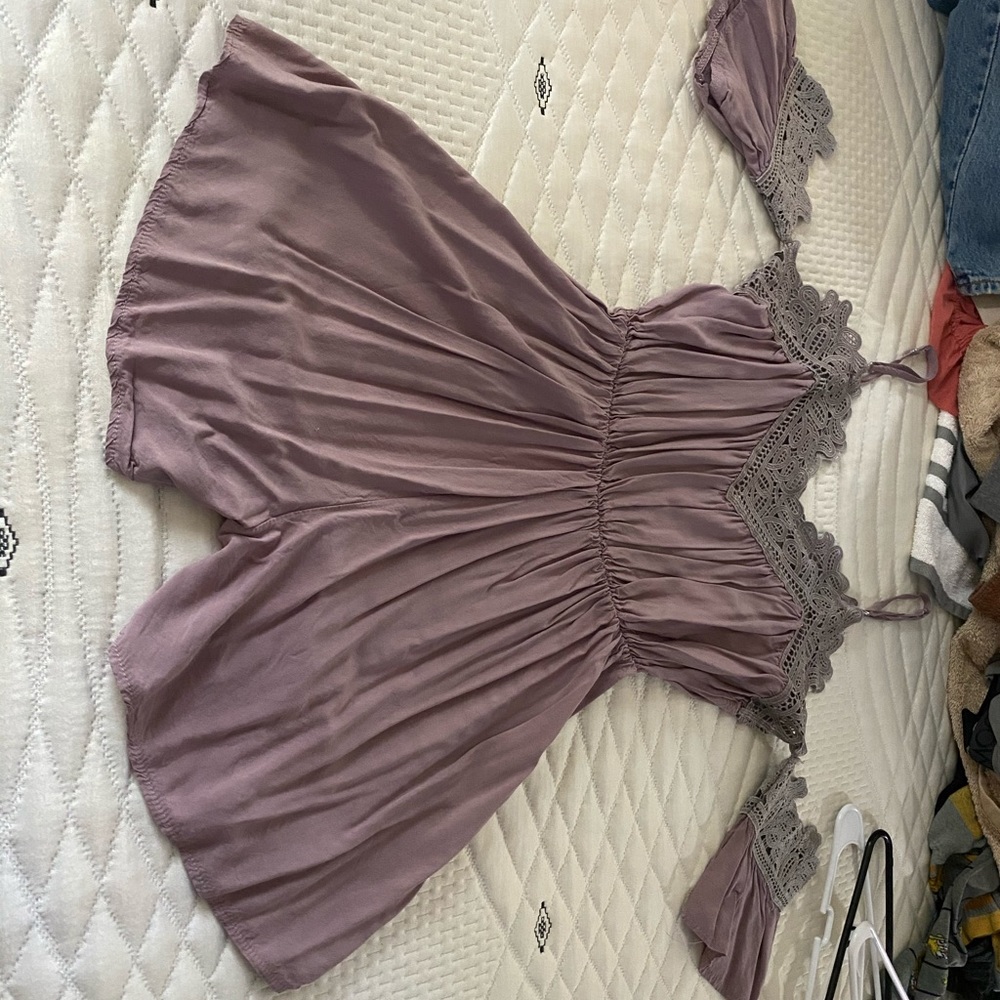 Size small purple romper